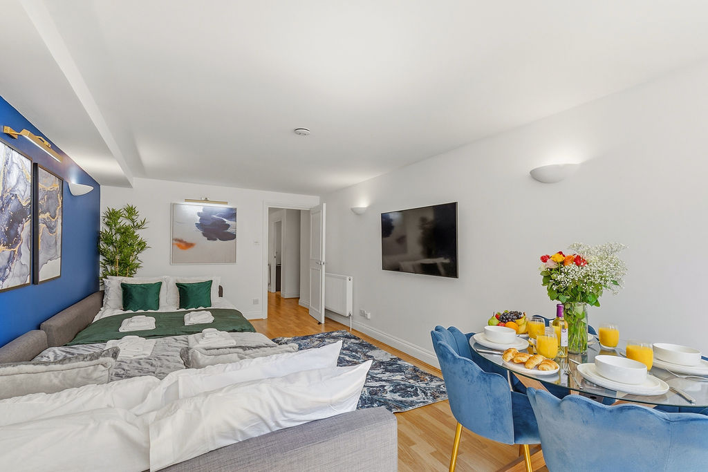 Photograph of the styled living and sleeping space